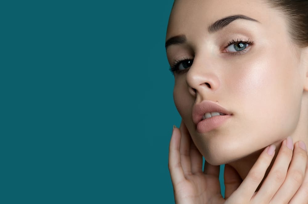 Permanent eyebrow makeup creating fuller-looking brows